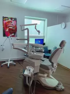 Фотография Белый зуб 0