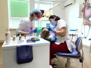 Фотография Белый зуб 4